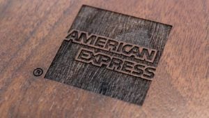 the American Express logo engraved in the wood