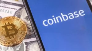 The Coinbase logo (COIN stock) on a smartphone screen with a BTC token.  Cryptocurrency winter is coming.