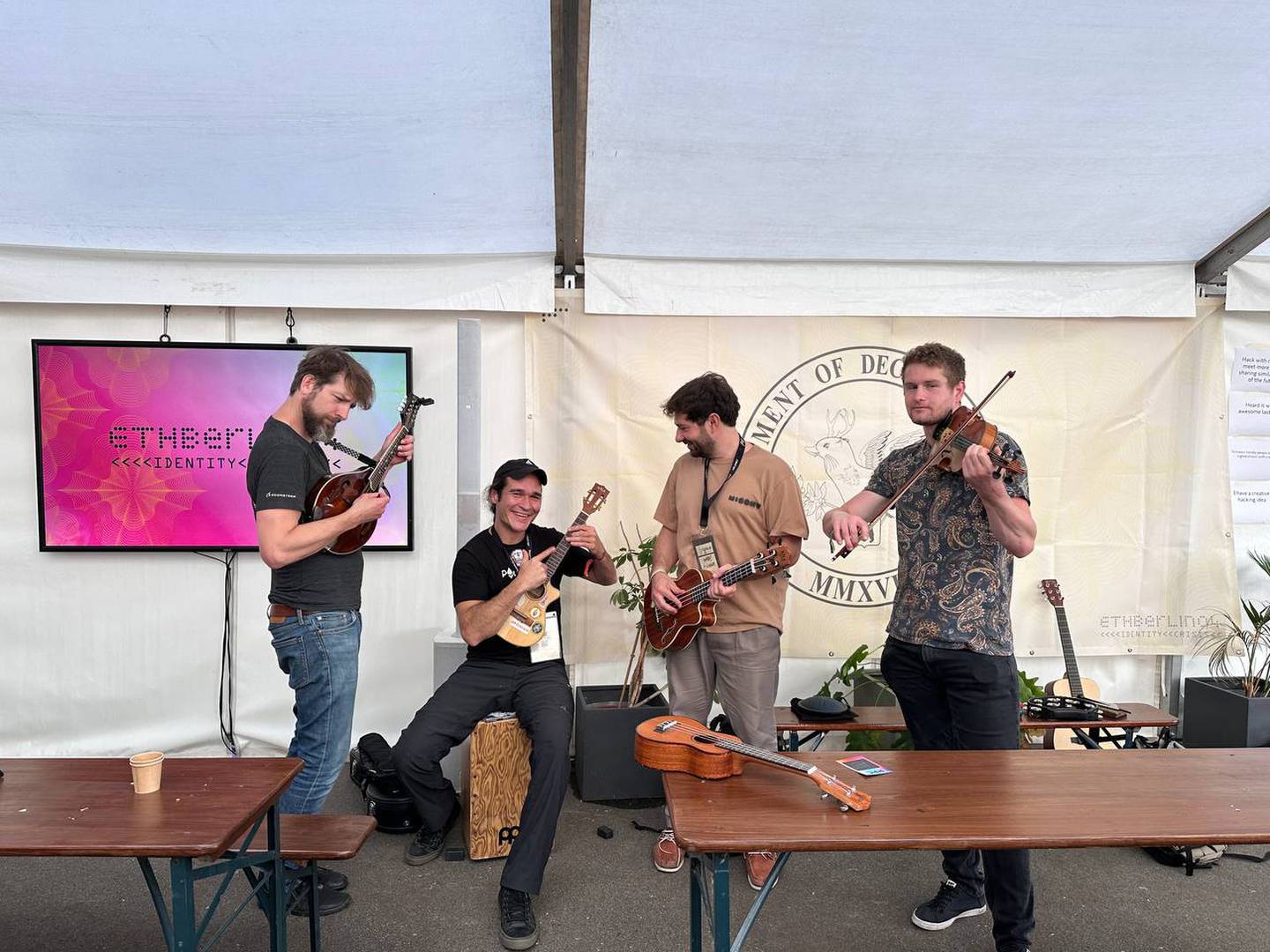 Volunteers and developers play music during a hackathon in Berlin.  Source: ETHBerlin.