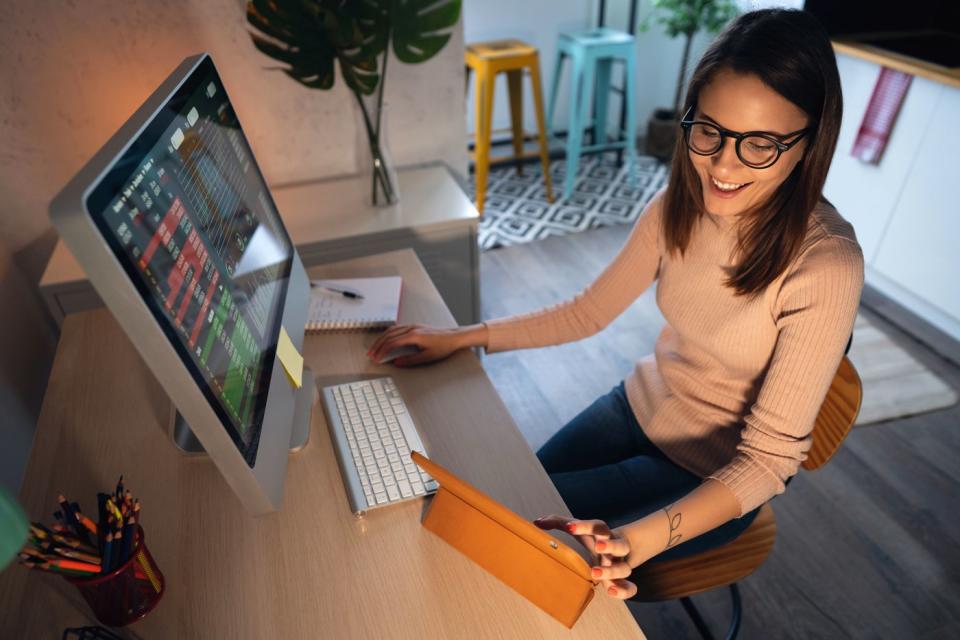 An investor working at a desk.