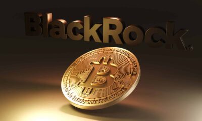 blackrock logo in background with a gold bitcoin in the foreground