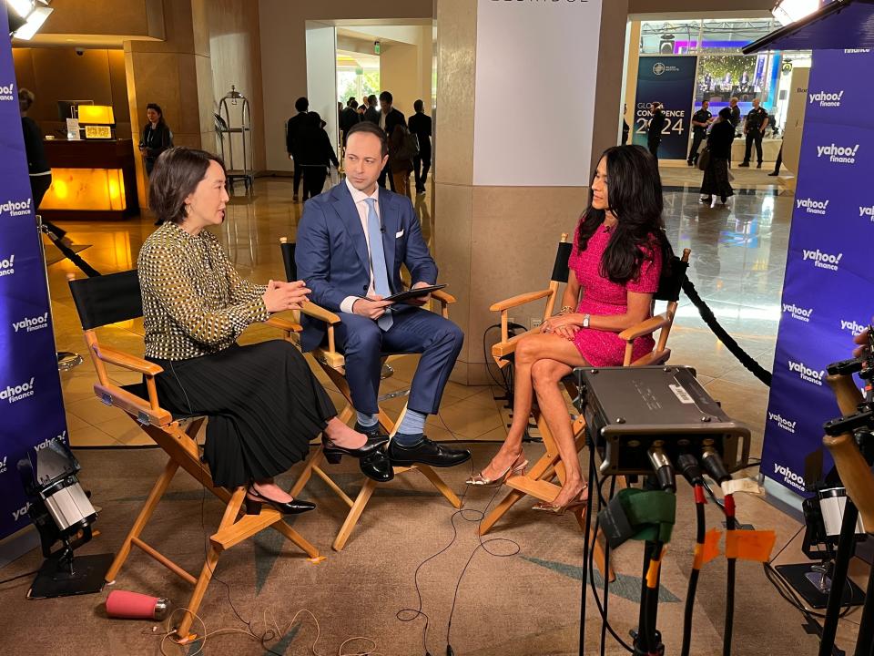 Sara Mailk, CIO at Nuveen, says put that money to work!  Mailik (right) speaks with Yahoo Finance Executive Editor Brian Sozzi and anchor Akiko Fujita at the Milken Institute Conference.