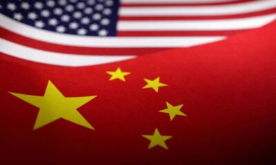 FILE PHOTO: Illustration shows U.S. and Chinese flags