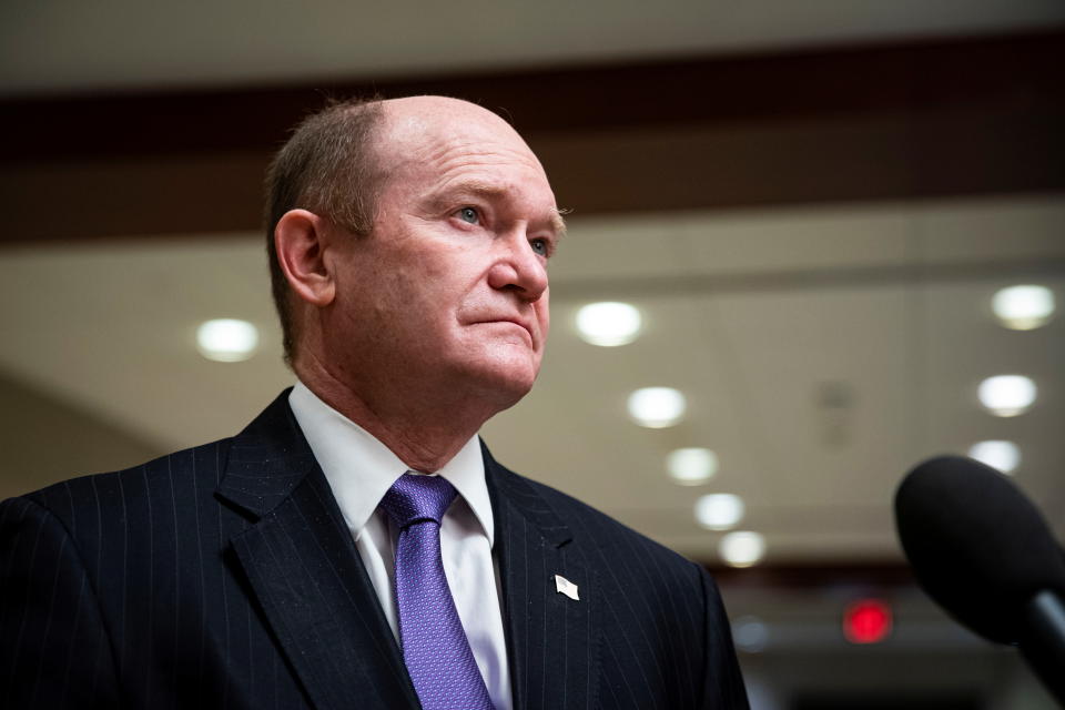 U.S. Senator Chris Coons (D-DE) speaks to reporters during a break of a joint Senate Armed Services and Foreign Affairs briefing on U.S. Afghanistan policy, on Capitol Hill in Washington, U.S., February 2, 2022 REUTERS/Al Drago