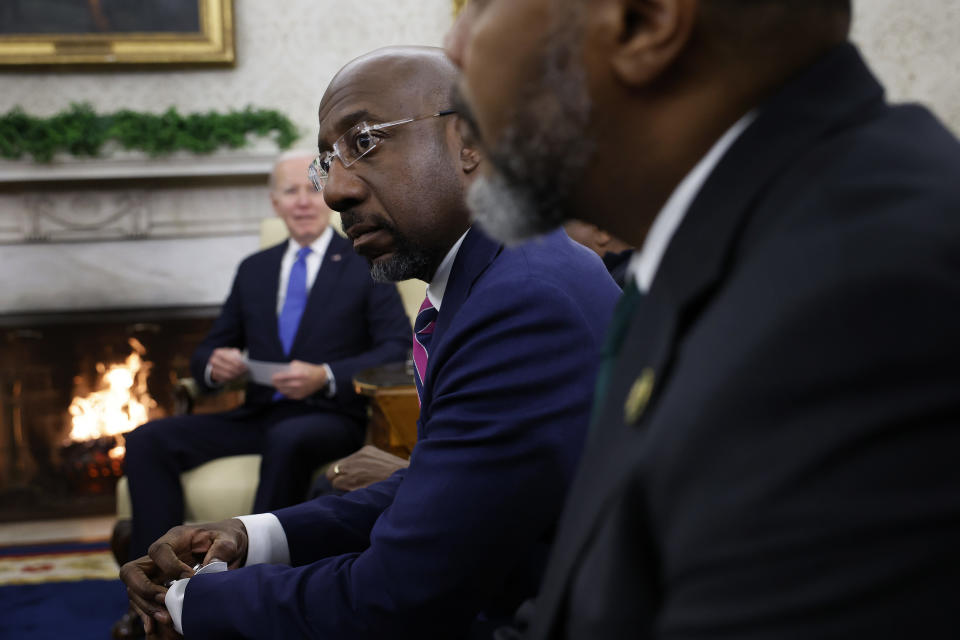 WASHINGTON, DC - FEBRUARY 02: Senator Raphael Warnock (D-GA)(C) and other members of the Congressional Black Caucus meet with US President Joe Biden in the Oval Office of the White House on February 2, 2023 in Washington, D.C.  Caucus members encouraged the administration to push for national law enforcement reform in the wake of several killings of unarmed black men, most recently the beating death of Tire Nichols by Memphis police officers.  (Photo by Chip Somodevilla/Getty Images)