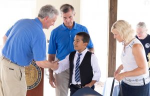 Boy receiving award