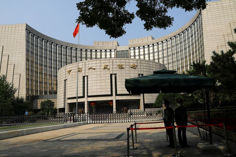 China keeps benchmark rates stable as People's Bank of China walks tightrope