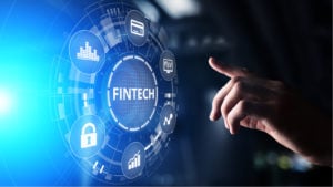undervalued fintech stocks A conceptual image of a hand reaching out to the word 