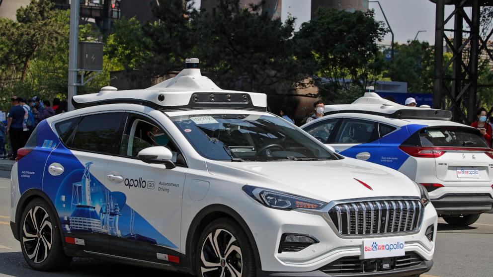 Driverless car hits person crossing red light in China