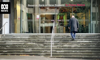 Reserve Bank of New Zealand keeps interest rates unchanged, building approvals rise, ASX closes lower after mixed Wall Street results — as it happened