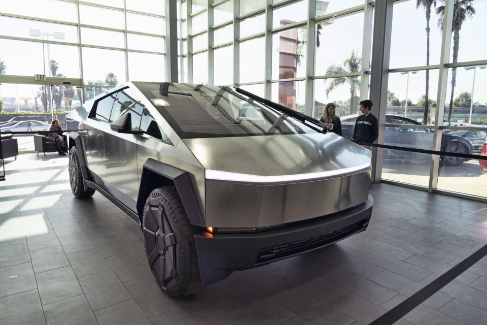 A Tesla Cybertruck is on display in Buena Park, California, on Dec. 3, 2023. (AP Photo/Richard Vogel)